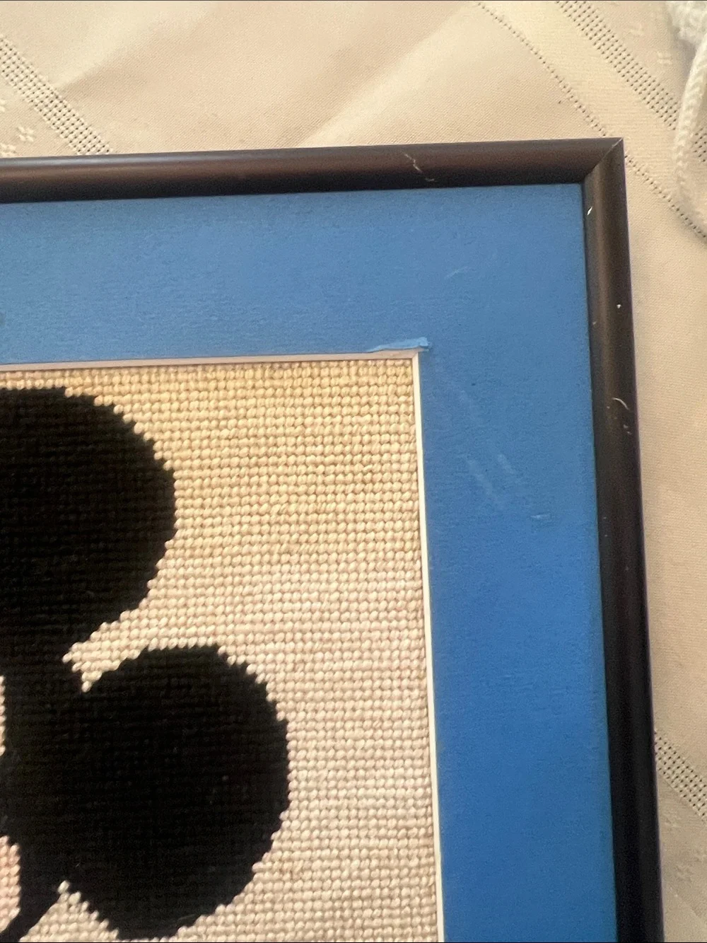 Framed and matted Handmade Cross-Stitch Mickey Mouse Artwork -